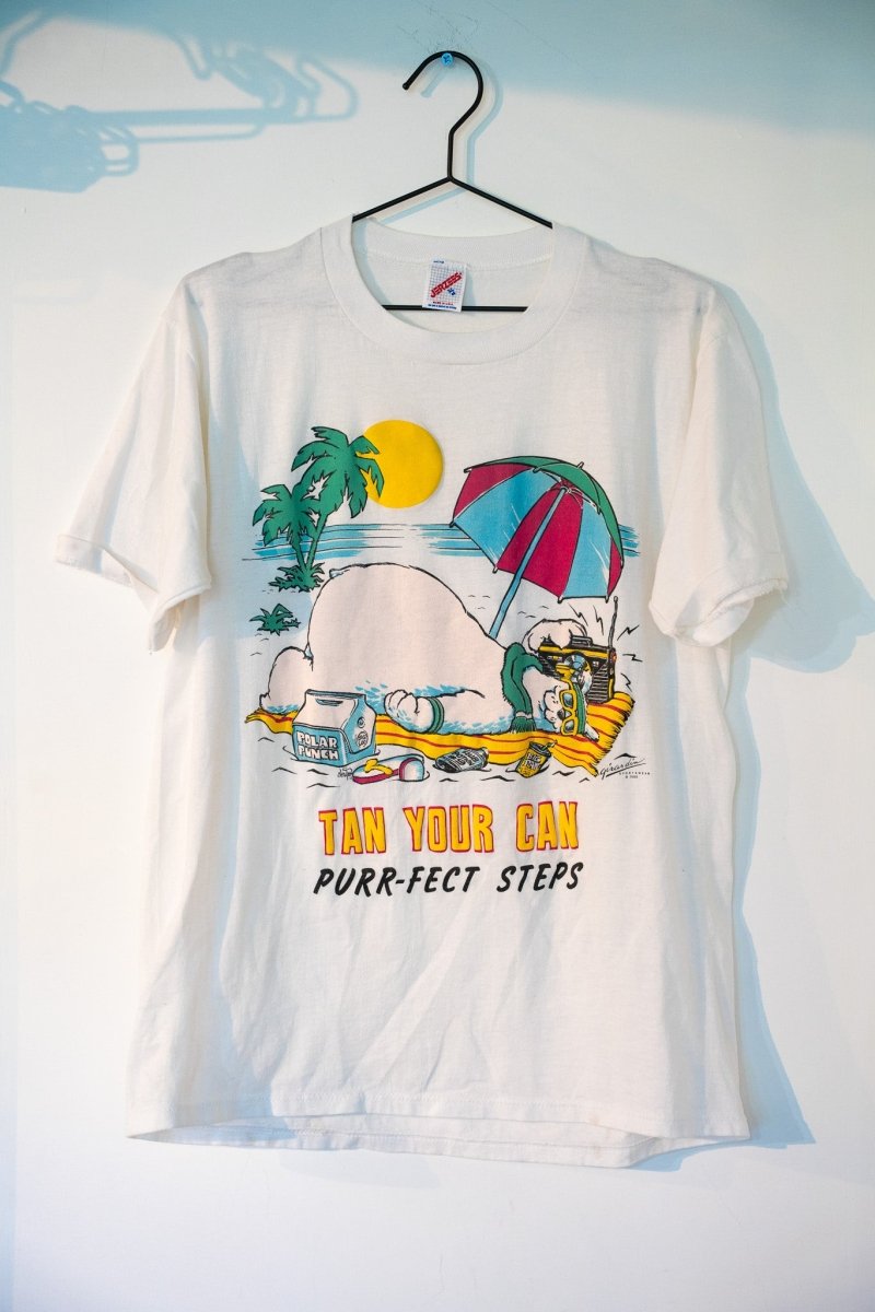 White 1988 Tan Your Can Purr-fect Steps tee with cartoon cat sunbathing on beach towel umbrella palm trees ocean yellow text size XL
