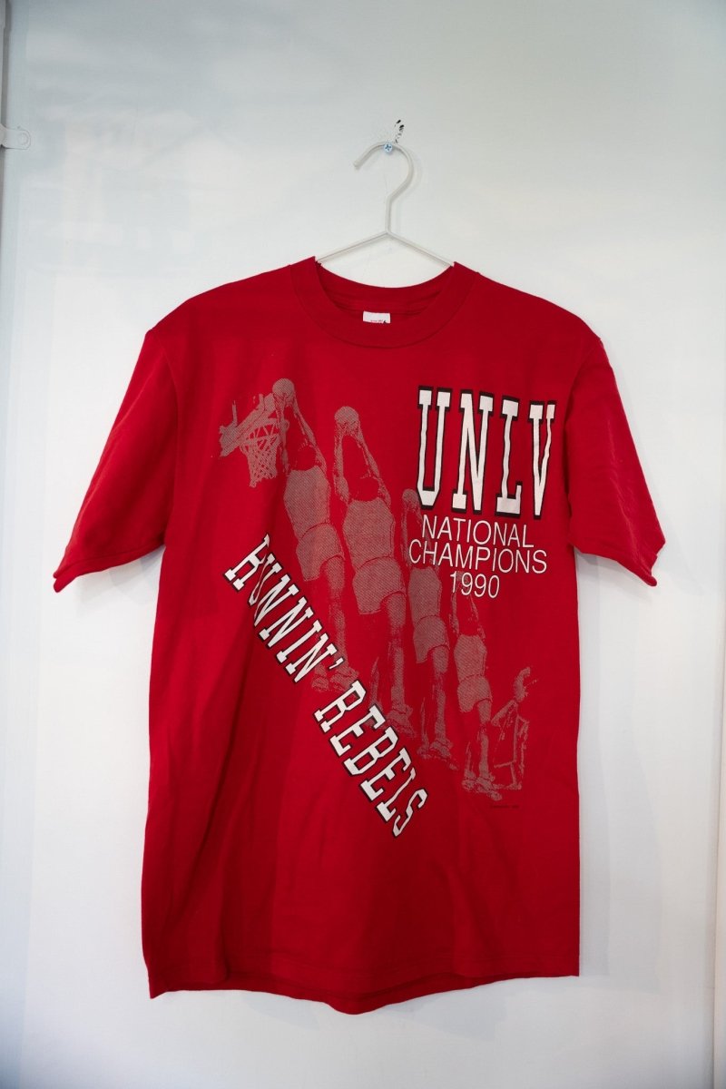 Red 1990 UNLV Runnin Rebels National Champions t-shirt with white UNLV text basketball player action sequence and diagonal RUNNIN REBELS lettering size Large