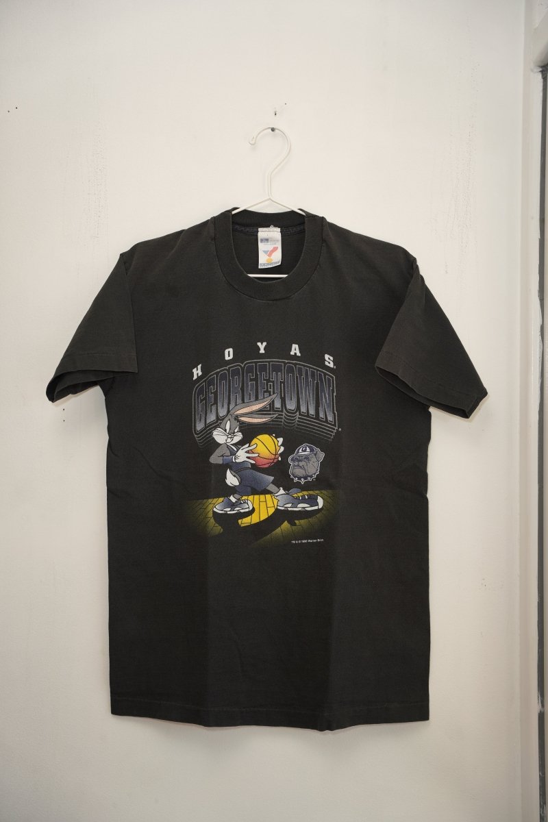 Black 1996 Georgetown Hoyas Bugs Bunny tee Bugs dribbling basketball spotlight court Bulldog mascot HOYAS GEORGETOWN text Warner Bros