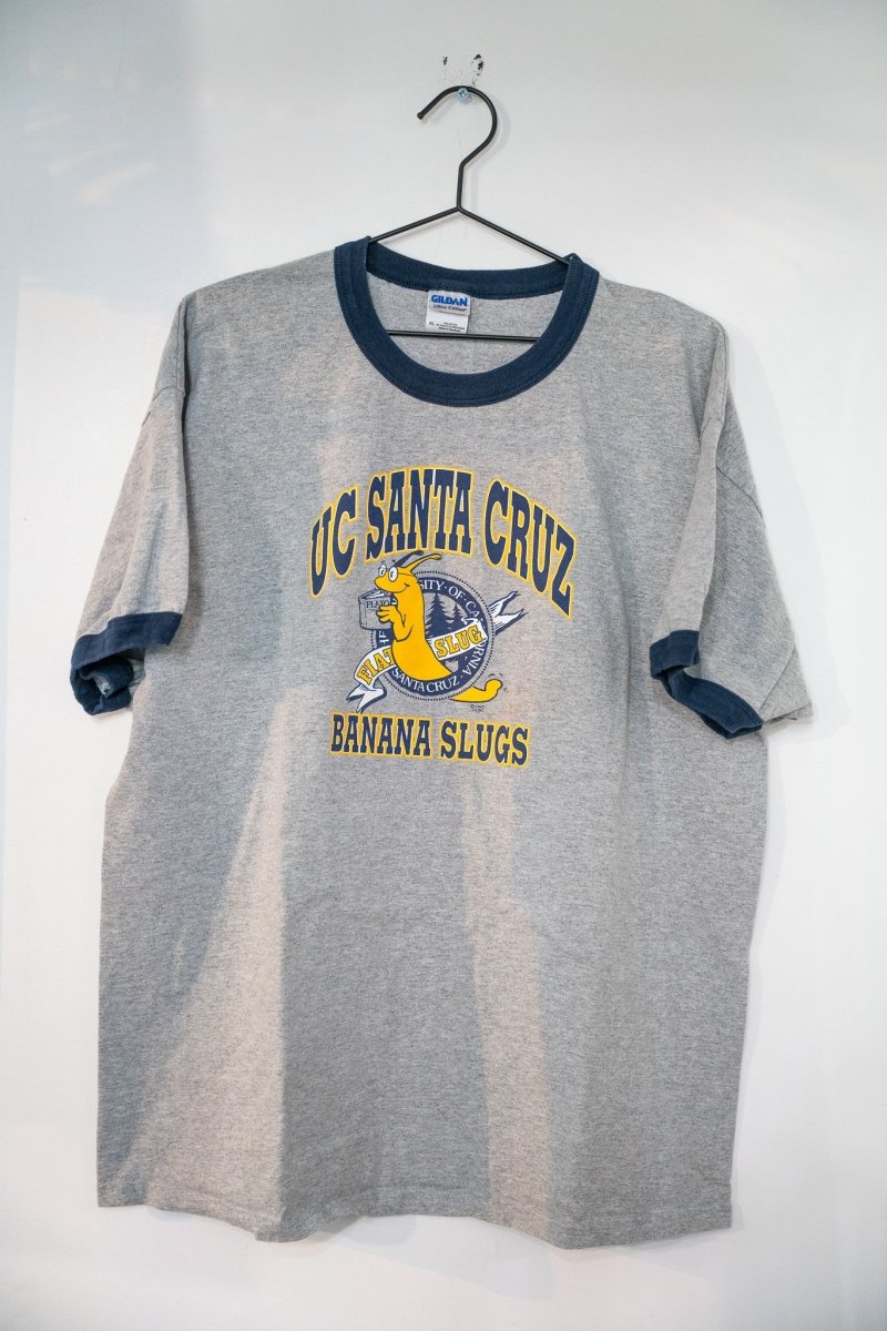 Heather gray UC Santa Cruz Banana Slugs ringer t-shirt with navy collar and cuffs yellow slug mascot and navy UC SANTA CRUZ lettering size XL