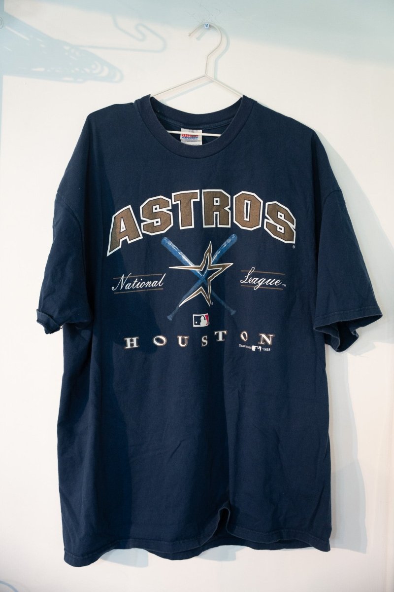 Dark navy 1998 Houston Astros baseball tee with gold ASTROS arch shooting star logo crossed bats National League HOUSTON text size XXXL