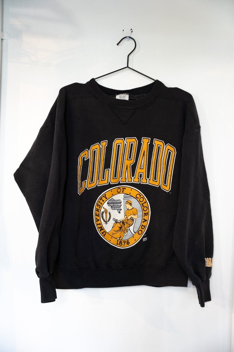 Black 80s University of Colorado crewneck sweater with gold arched COLORADO lettering and university seal with 1876 date