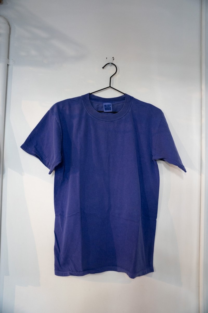 T-Shirt brand blue wave graphic blank shirt from the 1990s, size medium, displayed flat against white background