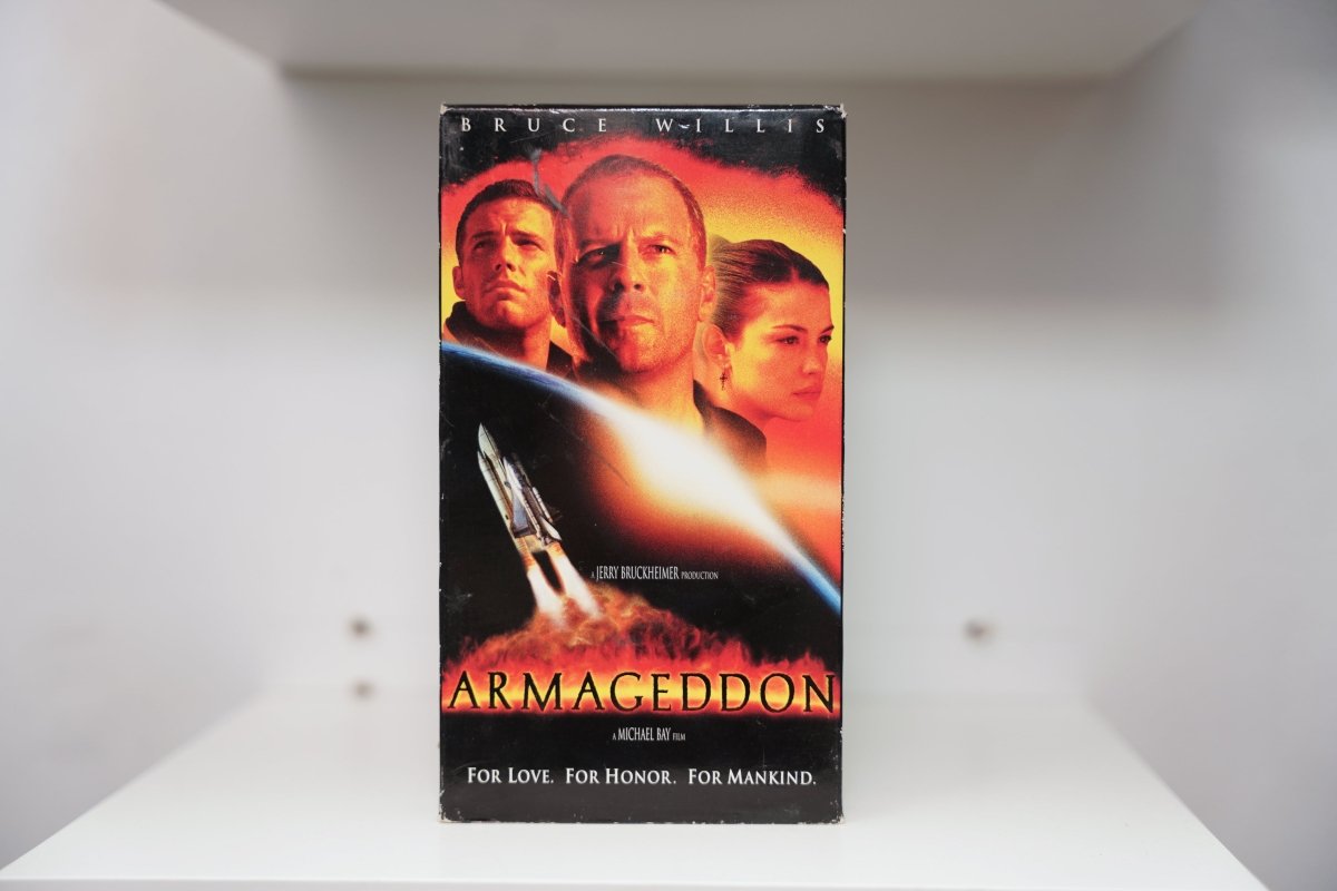 VHS Armageddon Bruce Willis Ben Affleck Liv Tyler shuttle launch BRUCE WILLIS ARMAGEDDON metallic text Bruckheimer Michael Bay For Mankind