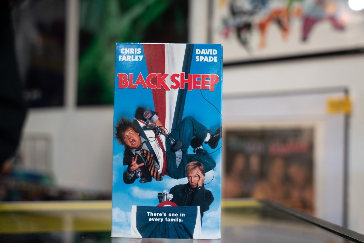 VHS Black Sheep VHS tape case with black cover and white text visible on spine and front panel against neutral background