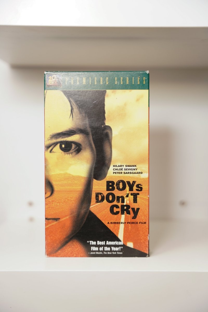 VHS Boys Don't Cry Hilary Swank face amber highway PREMIERE SERIES BOYS DON'T CRY distressed text Kimberly Peirce Best American Film New York Times