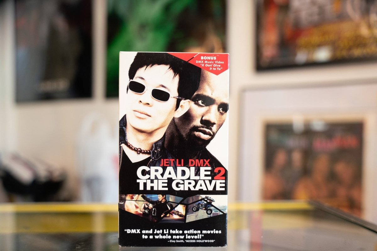 Warner Bros. Cradle 2 The Grave VHS tape case with black cover and white text spine against plain background
