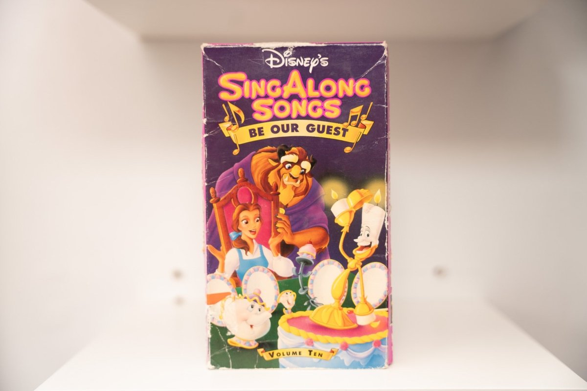 VHS Disney Sing Along Songs Be Our Guest Volume Ten Belle Beast Lumiere Cogsworth Mrs. Potts purple SING ALONG SONGS yellow text BE OUR GUEST banner