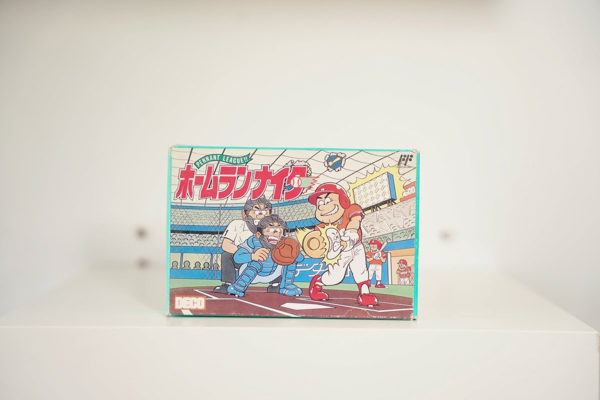 Nintendo Famicom Homerun Nighter box teal border cartoon batter red uniform catcher stadium PENNANT LEAGUE banner Homerun Nighter katakana DECO logo