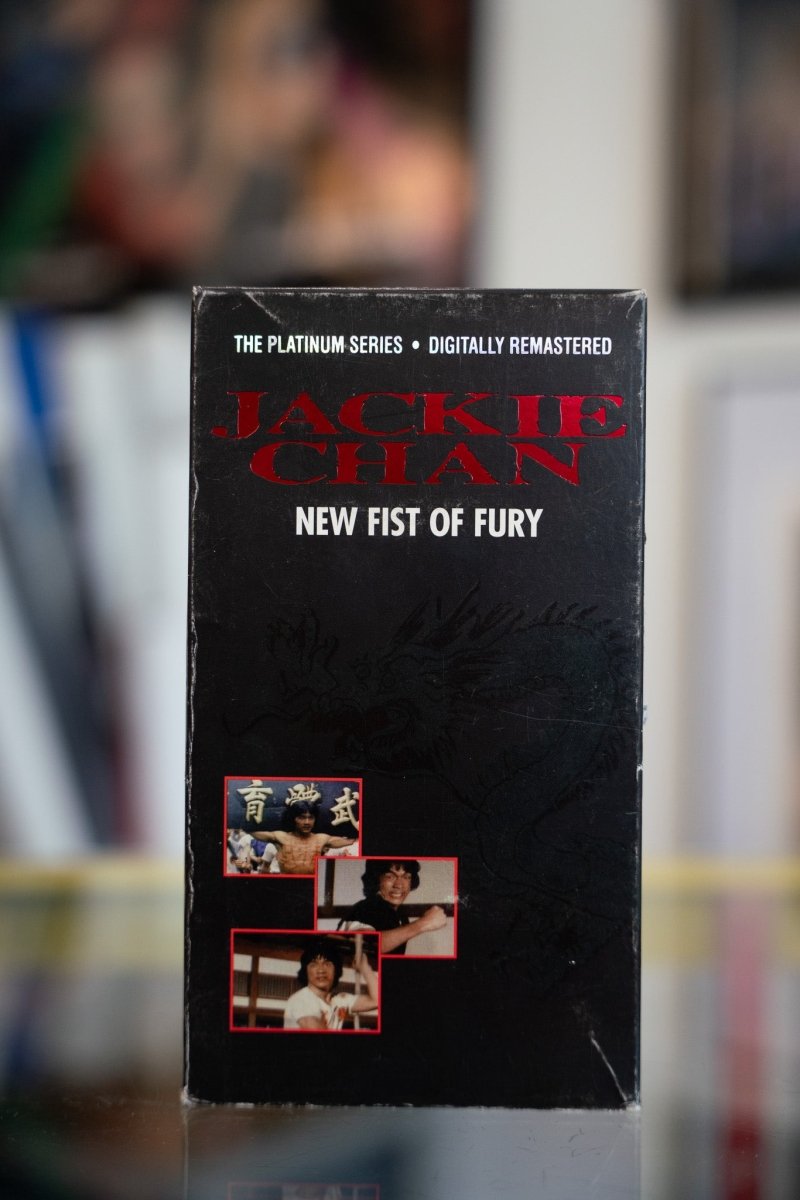 Jackie Chan New Fist of Fury VHS Platinum Series with red JACKIE CHAN lettering and three action photo stills on black cover