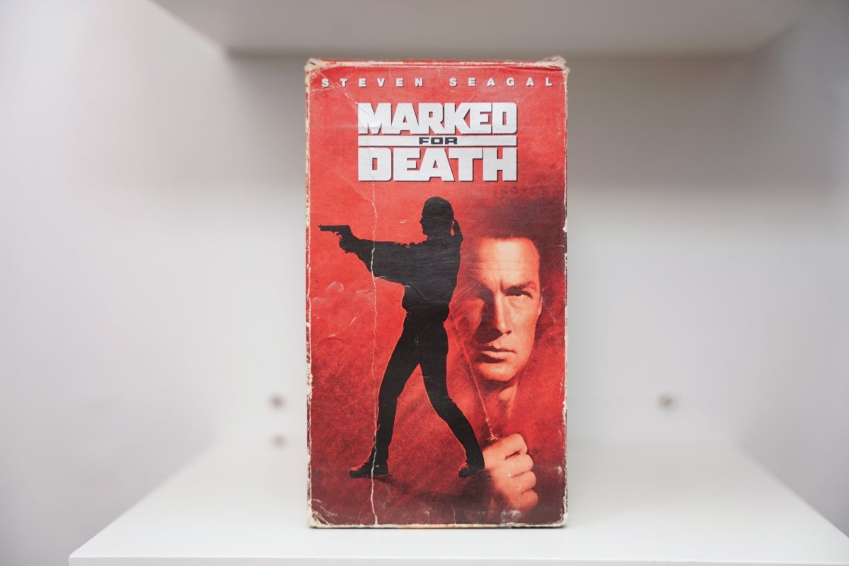 VHS Marked for Death red background Steven Seagal face fist silhouette gun STEVEN SEAGAL MARKED FOR DEATH white text