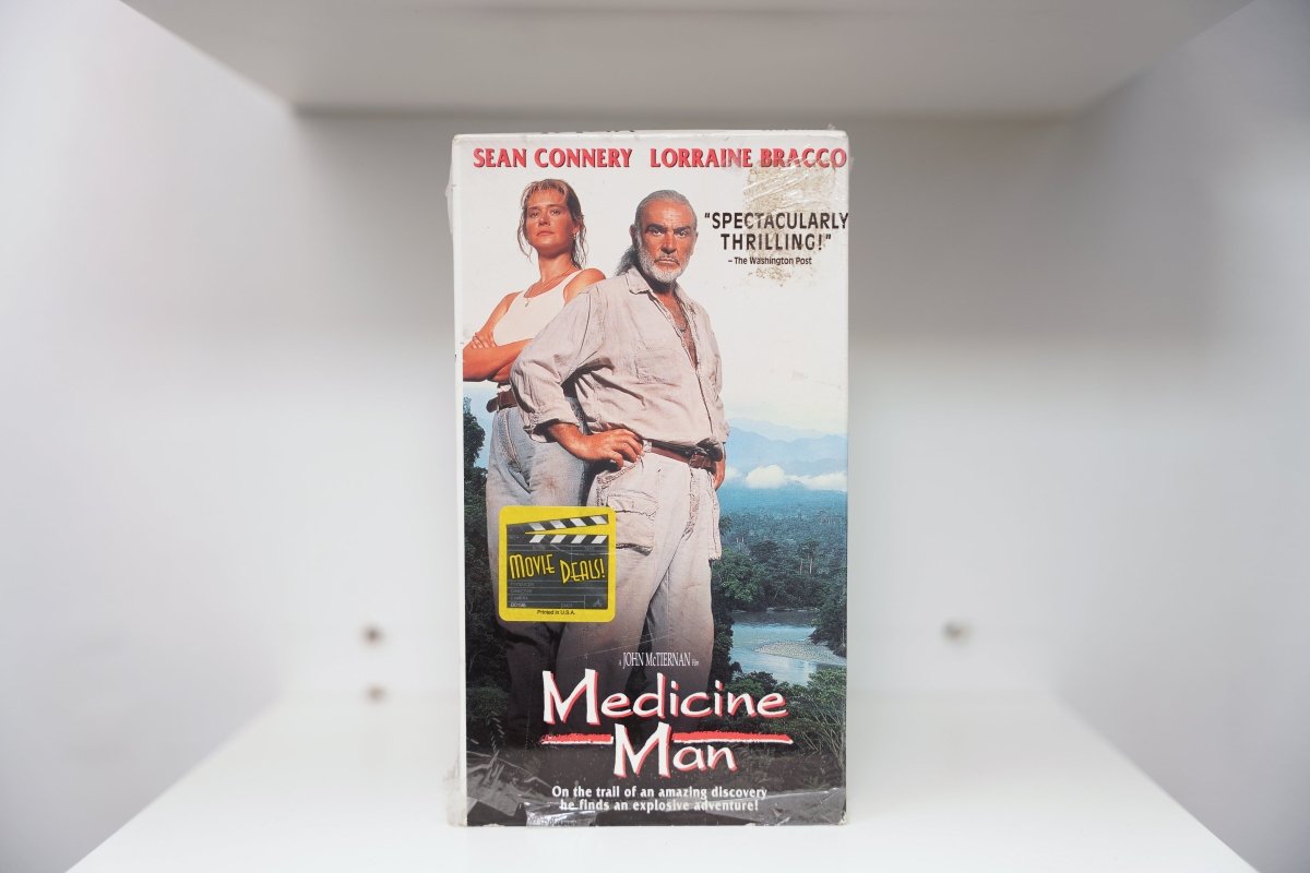 VHS Medicine Man Sean Connery bearded linen shirt Lorraine Bracco white tank rainforest river SEAN CONNERY Medicine Man text Washington Post Movie Deals