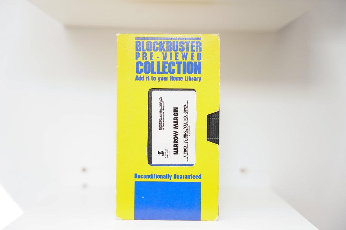 Narrow Margin VHS in yellow Blockbuster Pre-Viewed Collection sleeve with Carolco Home Video logo and catalog number 68924
