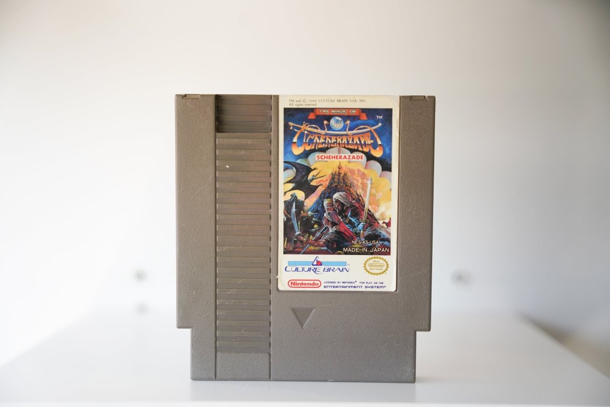 NES Magic of Scheherazade gray cartridge warrior horseback flames dragon palace SCHEHERAZADE gold red text Culture Brain Nintendo