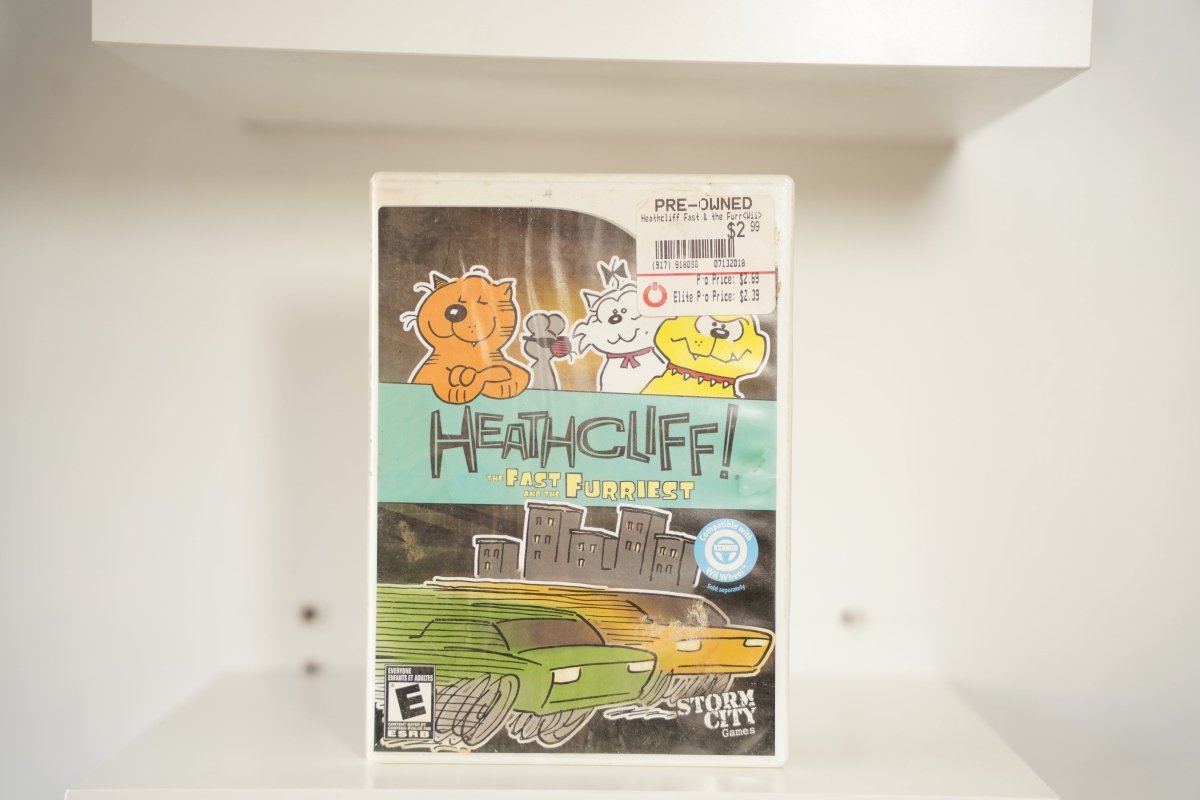 Nintendo Wii Heathcliff The Fast and the Furriest case orange cat friends HEATHCLIFF graffiti text racing cars city Storm City Games Everyone