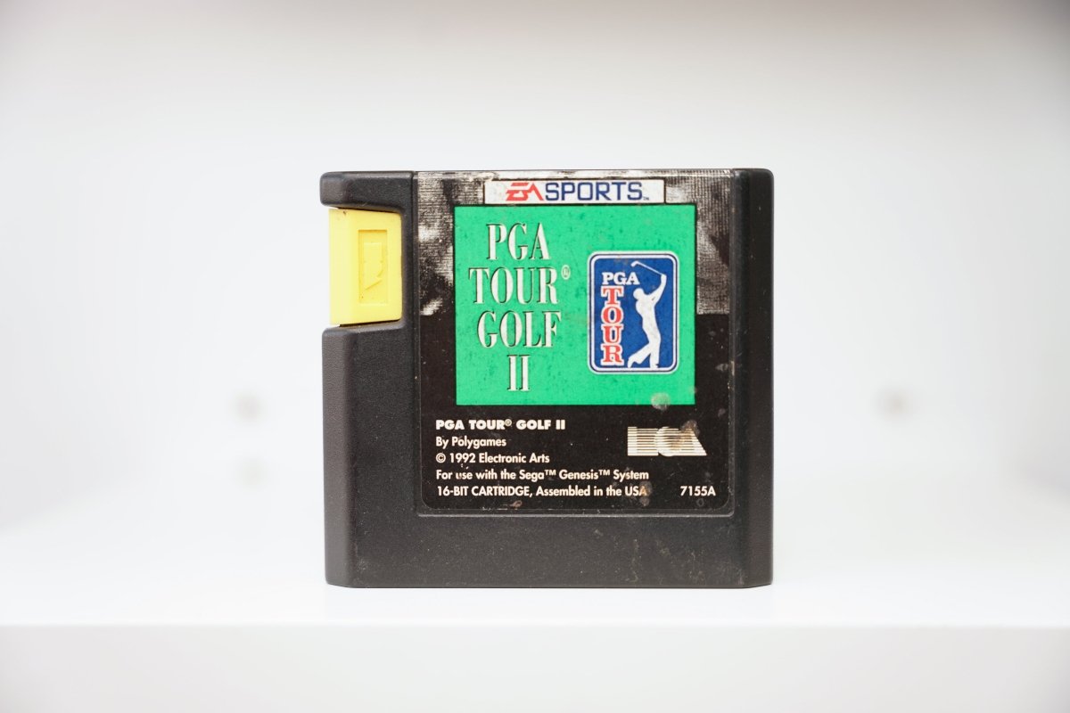 Sega Genesis PGA Tour Golf II black cartridge yellow tab green label PGA Tour logo golfer silhouette EA Sports 1992 Electronic Arts
