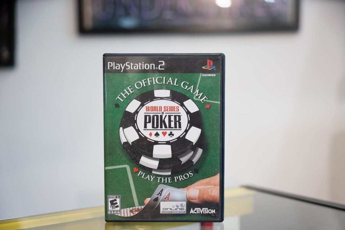 PlayStation 2 World Series of Poker case with green felt background black white poker chip logo pocket aces and Activision branding