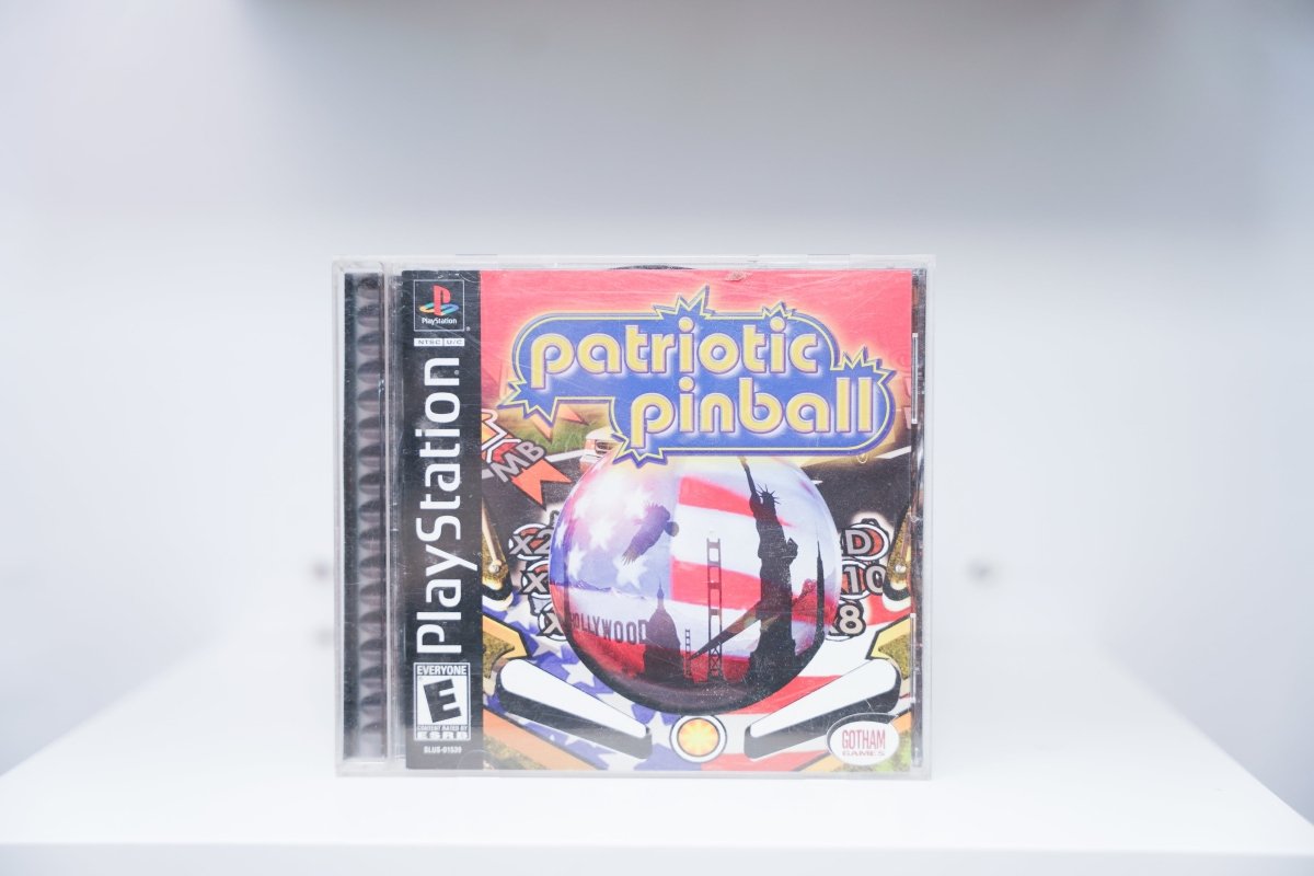 PlayStation Patriotic Pinball jewel case with chrome pinball reflecting Statue of Liberty, Golden Gate Bridge, Hollywood sign, American flag backdrop