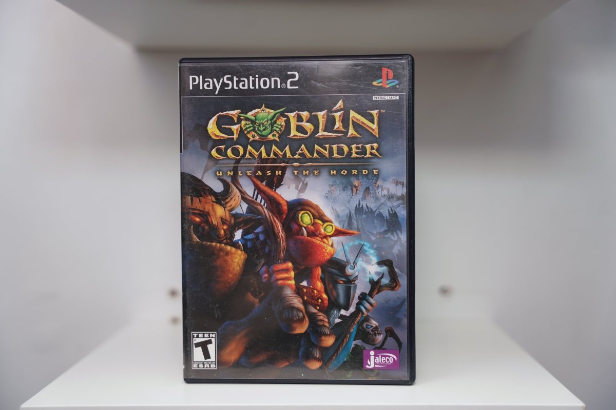 PS2 Goblin Commander Unleash The Horde case with colorful goblin warriors in fantasy armor, Jaleco logo, gold title text, Teen rating