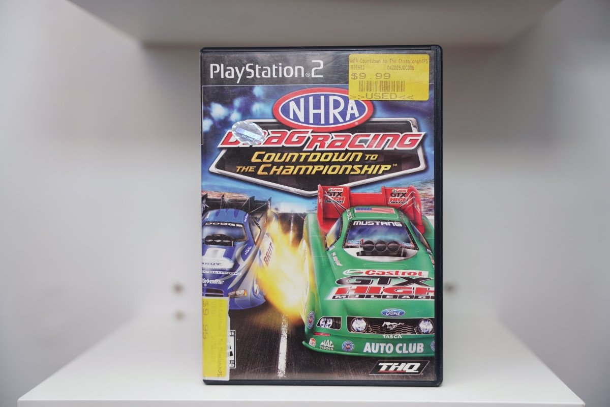 PS2 NHRA Drag Racing Countdown to the Championship case with two funny cars racing with flames, NHRA logo, THQ, $9.99 used sticker