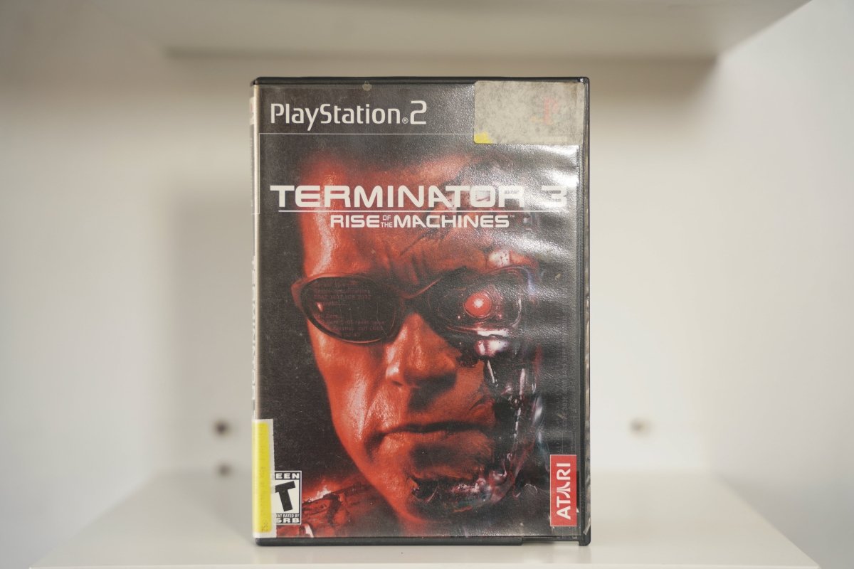 PS2 Terminator 3 Rise of the Machines case half human half endoskeleton face red eye sunglasses TERMINATOR 3 chrome text Atari Teen