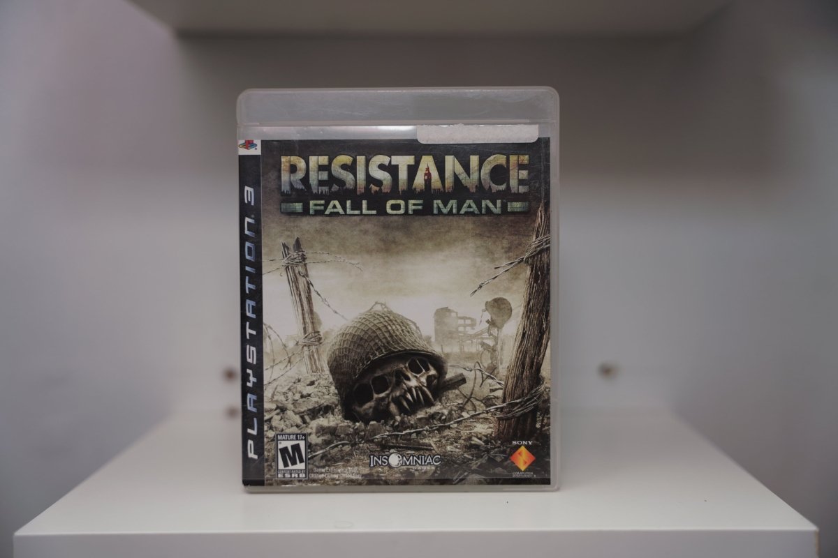 PlayStation 3 Resistance Fall of Man PS3 case sepia war-torn landscape skull helmet rubble barbed wire London skyline RESISTANCE text Insomniac Mature
