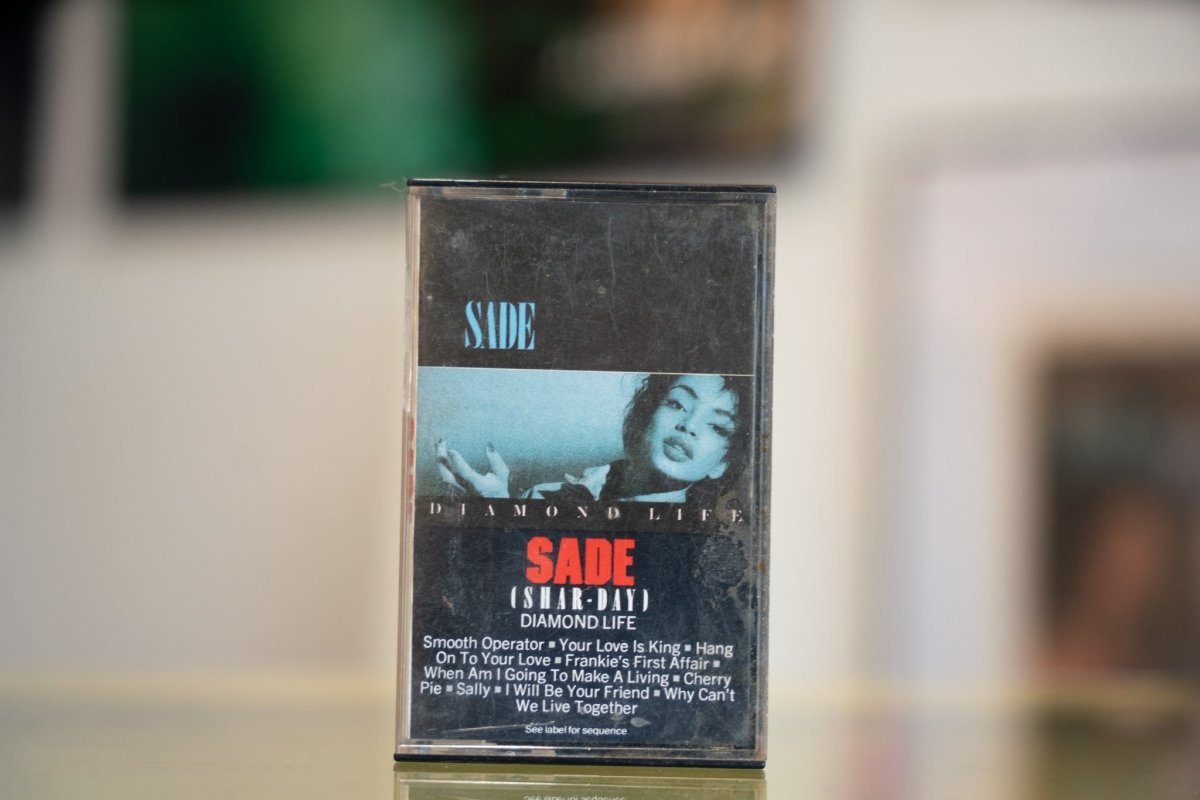 Sony Music Sade Diamond Life cassette tape from 1984, showing front cover artwork with album title and artist name in black text on light background