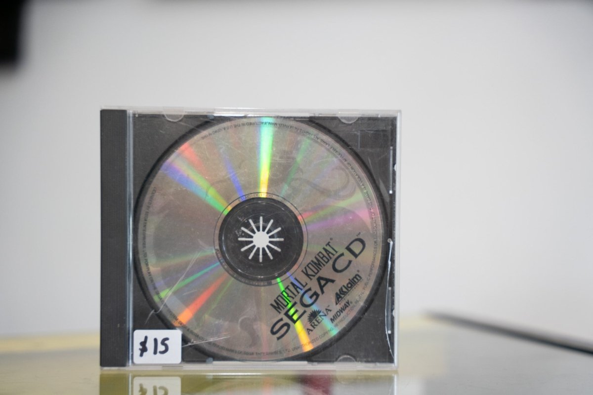 Sega CD Mortal Kombat disc only silver holographic disc in clear jewel case MORTAL KOMBAT SEGA CD text Arena Midway Acclaim