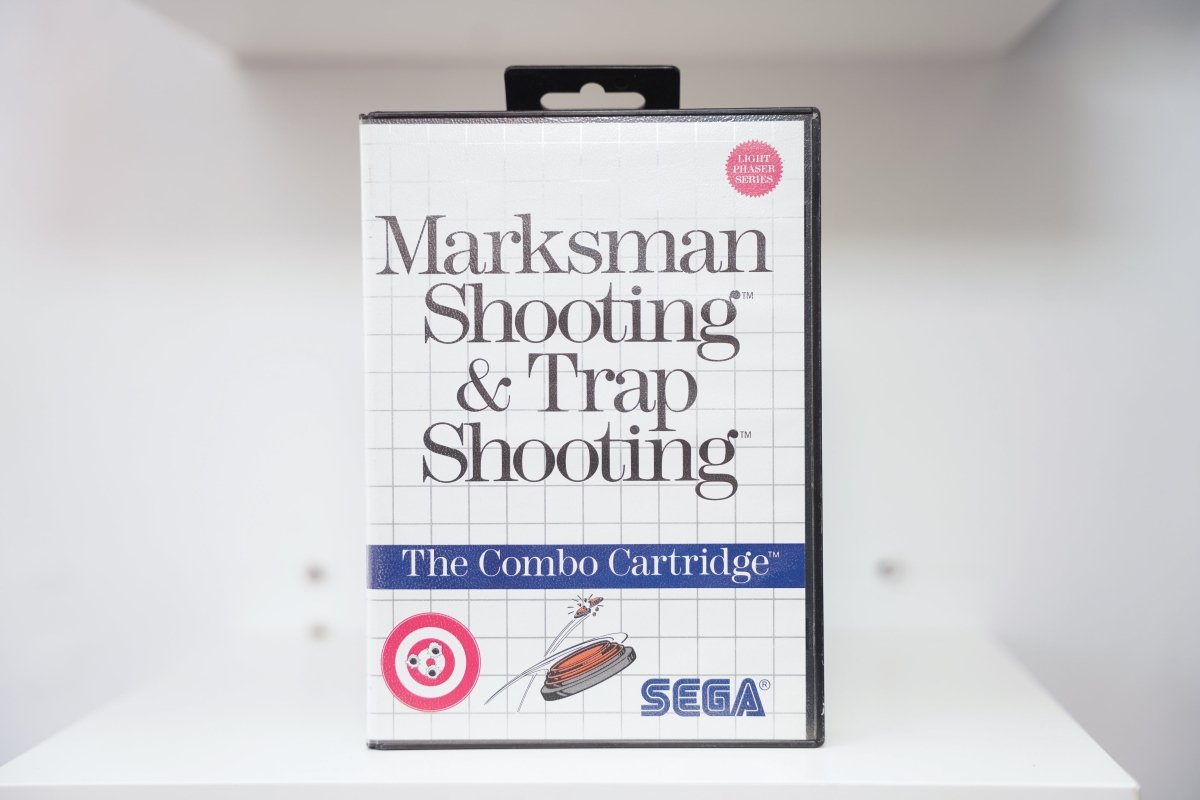 Sega Master System Marksman Shooting and Trap Shooting clamshell case with target and clay pigeon illustrations, Light Phaser Series badge