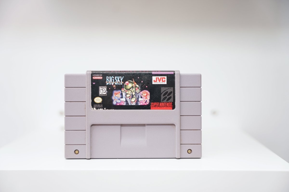 SNES Big Sky Trooper grey cartridge with cartoon space trooper and alien characters against space background, JVC logo, Kids to Adults