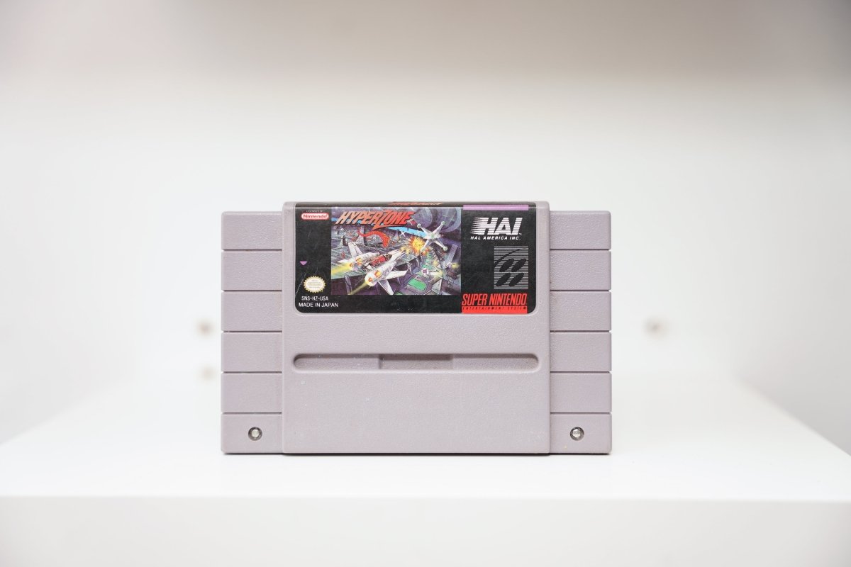 SNES HyperZone grey cartridge with futuristic spacecraft in tunnel firing weapons, HAL America Inc logo, Made in Japan