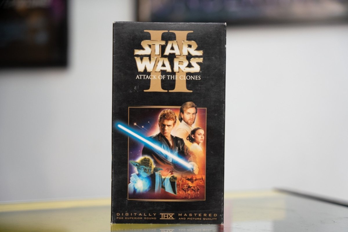 Star Wars Attack of the Clones Episode II VHS black sleeve with gold II Roman numeral gold STAR WARS logo character montage with Anakin Yoda and THX badge
