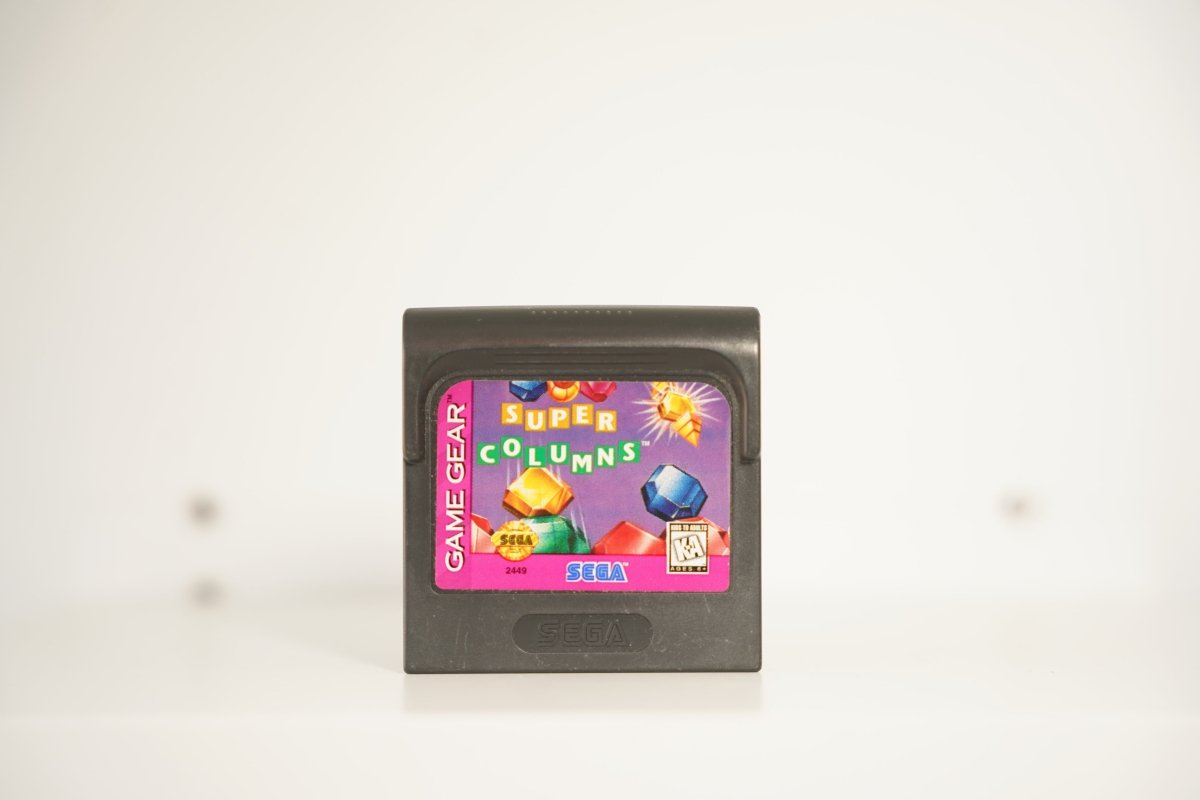 Sega Game Gear Super Columns black cartridge colorful jewels gems purple background SUPER COLUMNS green white text Sega KA 2449