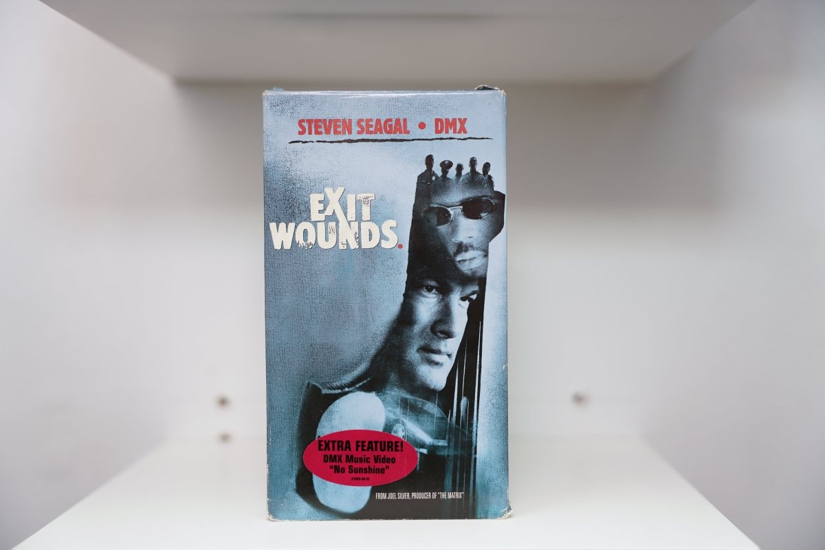 VHS Exit Wounds blue gray cover Steven Seagal leather jacket DMX sunglasses EXIT WOUNDS white text DMX music video badge Warner Bros