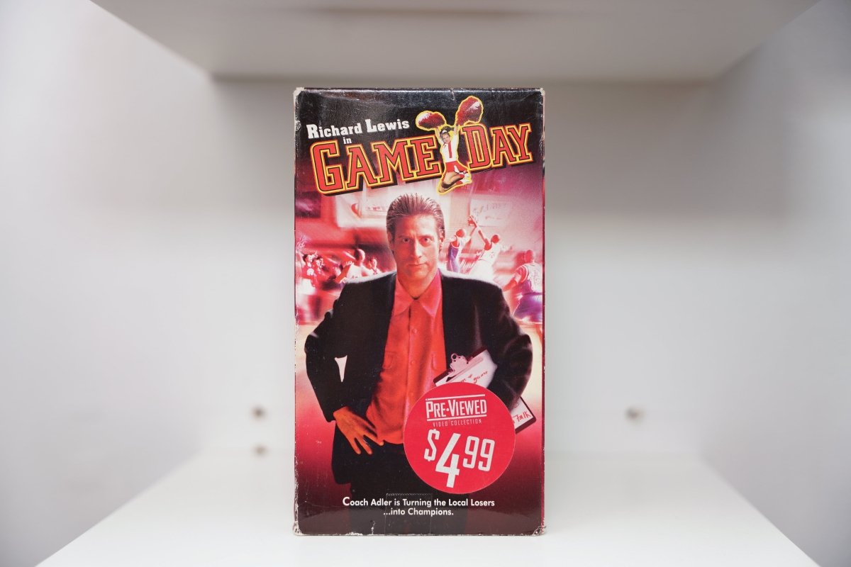 VHS Game Day red cover Richard Lewis blazer red shirt basketball action GAME DAY yellow red text coach tagline Pre-Viewed sticker