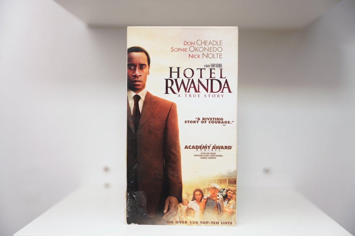 VHS Hotel Rwanda Don Cheadle brown suit solemn HOTEL RWANDA serif text A TRUE STORY Don Cheadle Sophie Okonedo Nick Nolte Academy Award