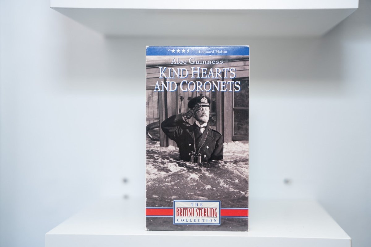 VHS Kind Hearts and Coronets British Sterling Collection blue banner Alec Guinness naval captain black and white photo KIND HEARTS AND CORONETS blue text