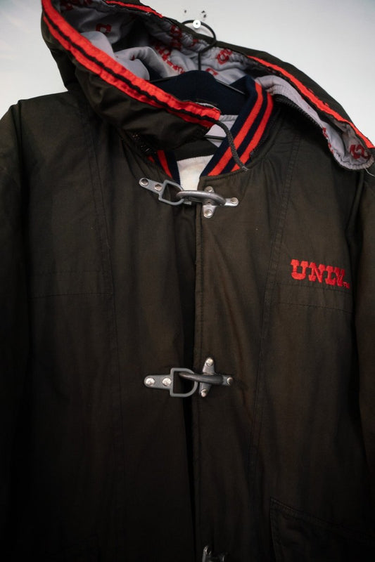 Starter 1991 UNLV Runnin' Rebels "Fireman" parka in red nylon with team logo, missing zipper, displayed flat lay on white background