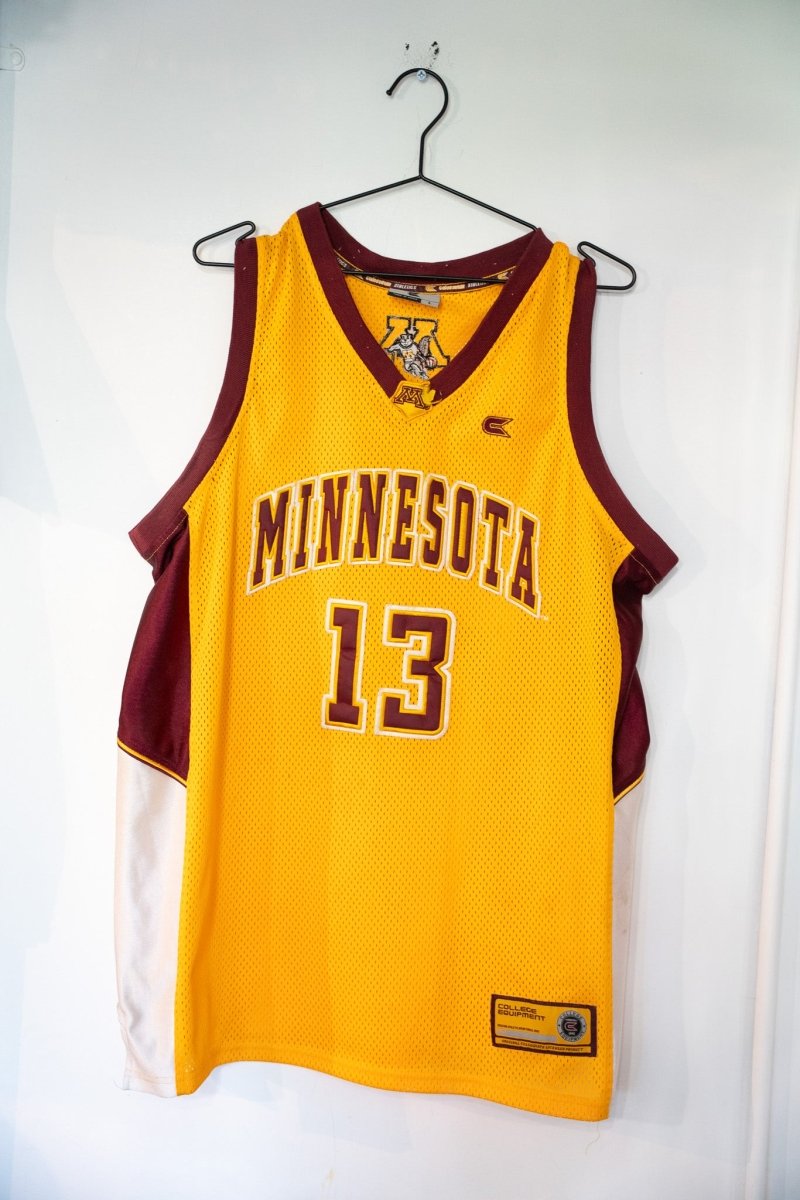 Colosseum Athletics Minnesota Golden Gophers college basketball jersey in maroon with gold trim, size large, displayed flat