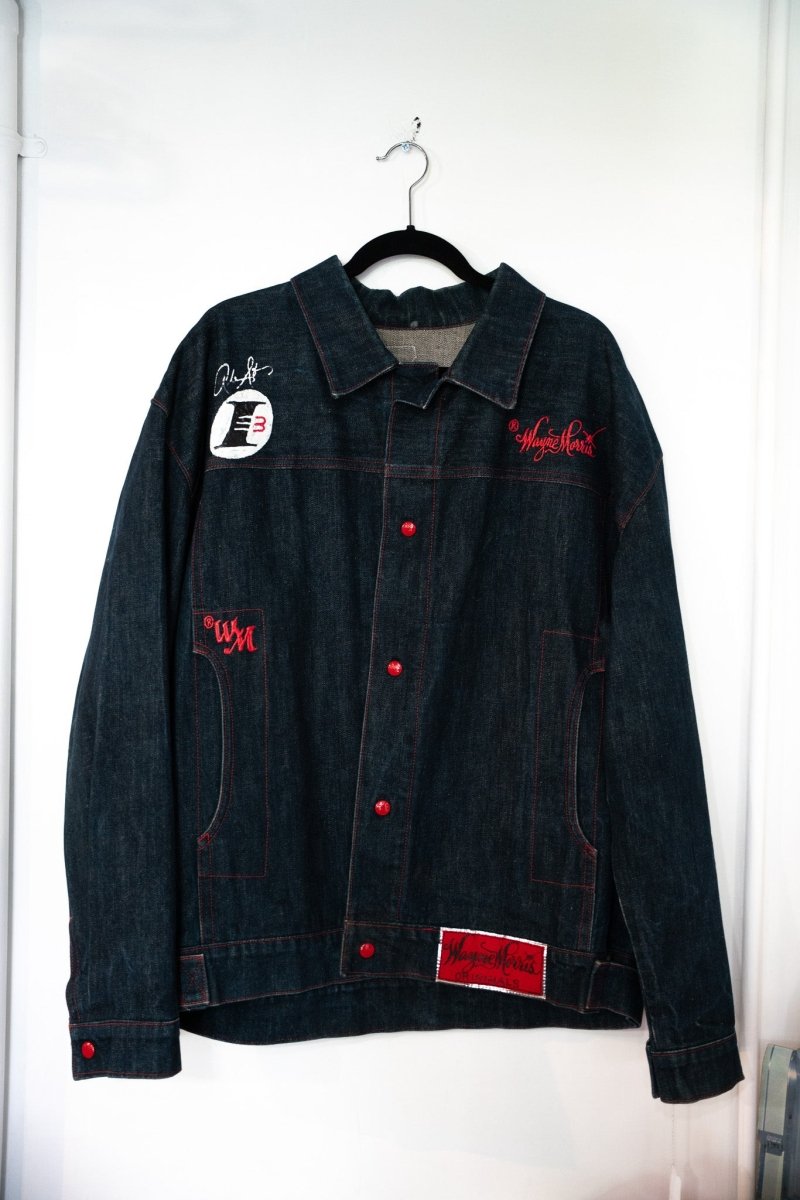 Dark indigo vintage Wayne Morris denim trucker jacket with red snap buttons red stitching WM monogram I3 patch red Wayne Morris label size XL