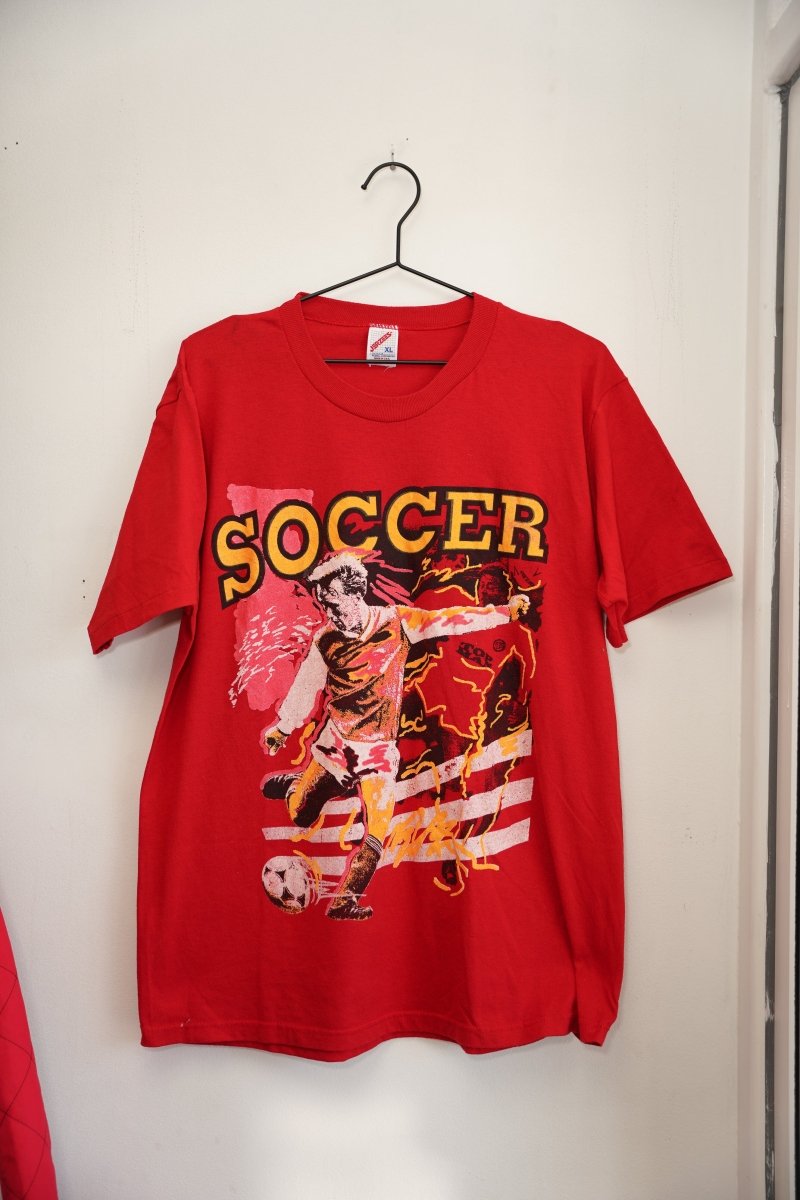 Red vintage Jerzees Soccer tee SOCCER yellow gold text soccer player kicking flames energy red cotton