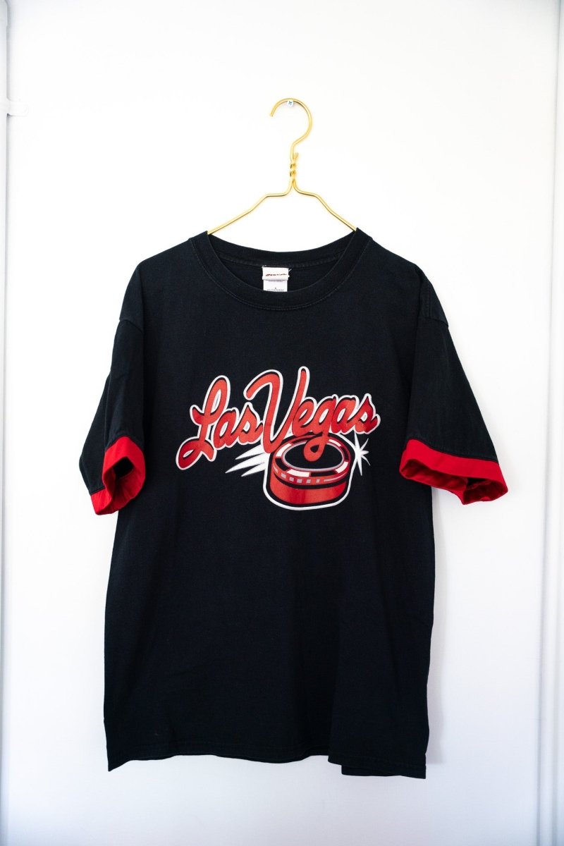Black vintage Las Vegas Wranglers hockey tee red Las Vegas script text hockey puck graphic red sleeve cuffs layered look size Large