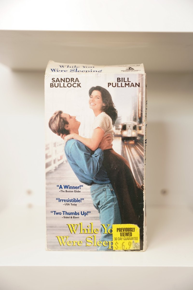 VHS While You Were Sleeping Sandra Bullock Bill Pullman embrace denim Chicago train A Winner Irresistible Two Thumbs Up While You Were Sleeping script Previously Viewed