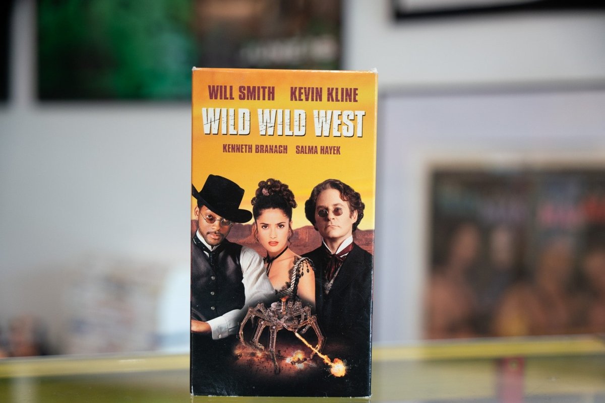 Warner Bros. Wild Wild West VHS tape with artwork featuring the film title and Western imagery on the front cover, 1999 release