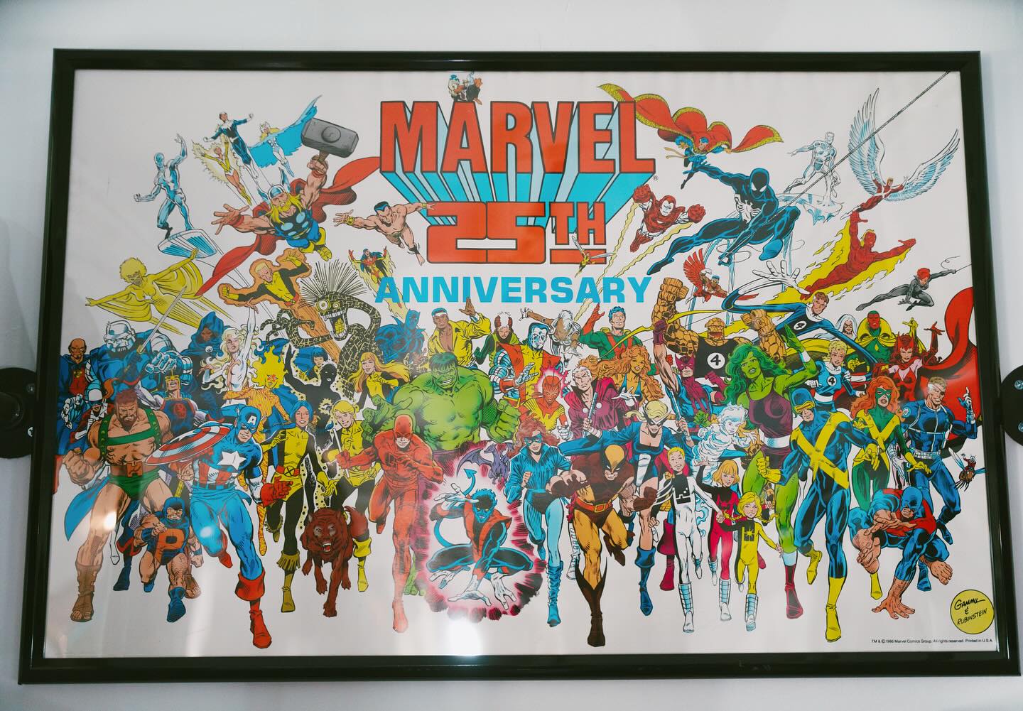 Vintage 1986 Marvel 25th Anniversary Poster on the Wall