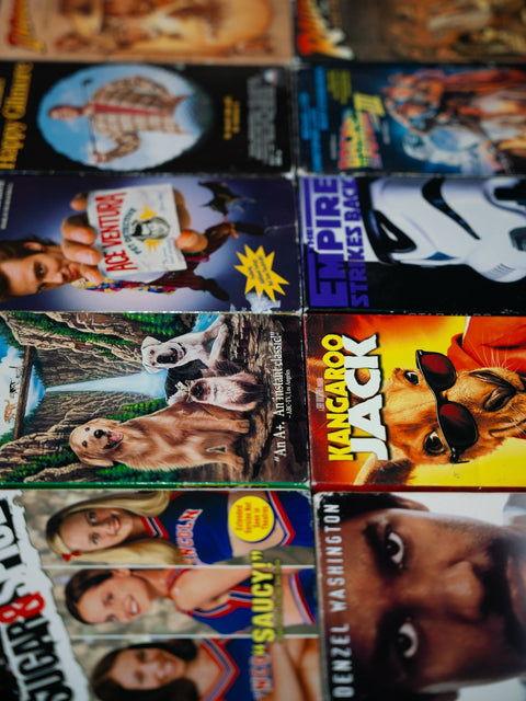 Vintage 90s VHS grid. Ace Ventura, Empire Strikes Back, Sister Act, Happy Gilmore at Keep It Classic Las Vegas.