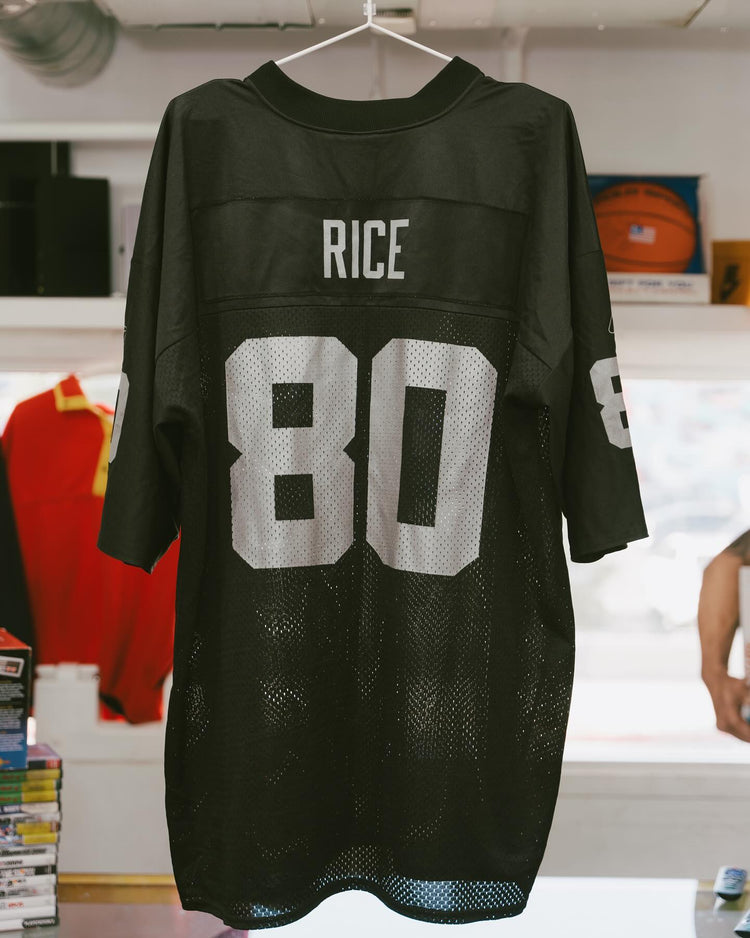 Vintage NFL jerseys on hangers at Keep It Classic — Raiders Jerry Rice #80, 90s Starter cut