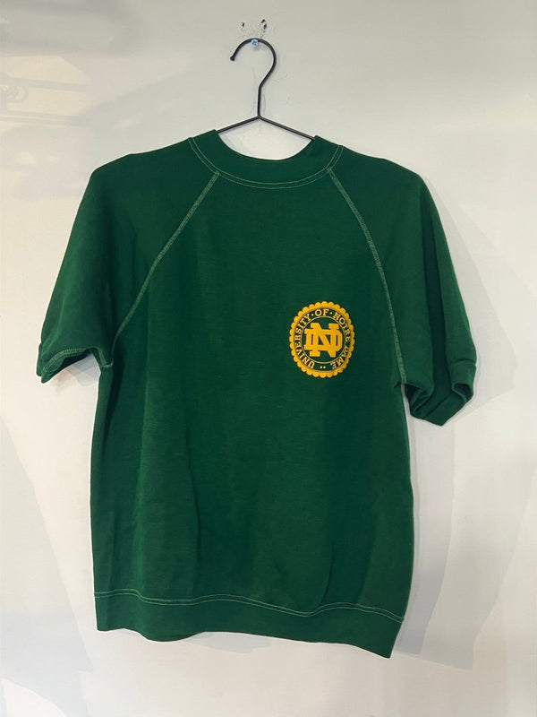 Kelly green 1970s Champion University of Notre Dame short-sleeve raglan sweatshirt with gold ND seal on left chest