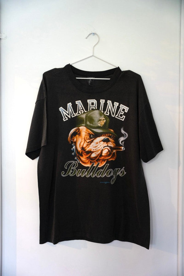 Black 1989 Marine Bulldogs tee with cigar-smoking bulldog in olive military helmet USMC emblem MARINE arched text Bulldogs script size XL