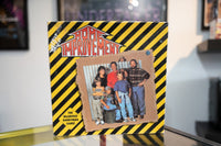 1993 Home Improvement board game square box yellow black hazard stripes cast photo Tim Allen family Home Improvement logo Hilarious Handyman Game
